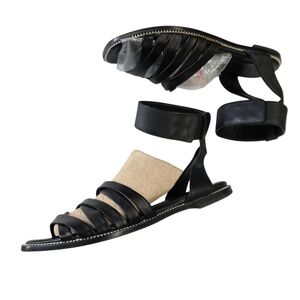 McQ by Alexander McQueen leather  Gladiator  Black crisscross   Sandals